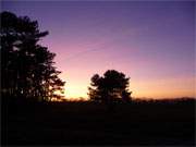 Farbspiel ber der Halbinsel Loddiner Hft: Winterlicher Sonnenuntergang.
