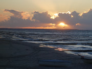 Ende eines langen Urlaubstages: Sonnenuntergang ber der Ostsee.